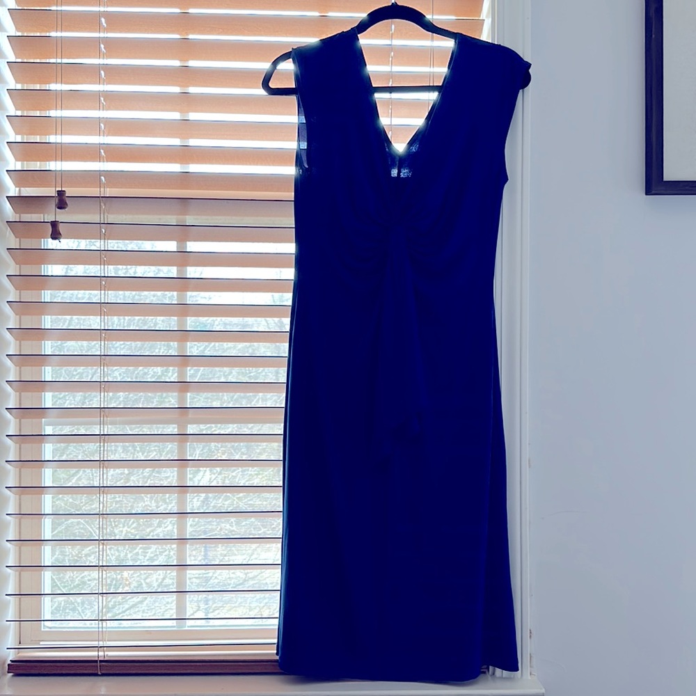 Perfect Easter dress! Light and silky blue dress machine washable size 10.